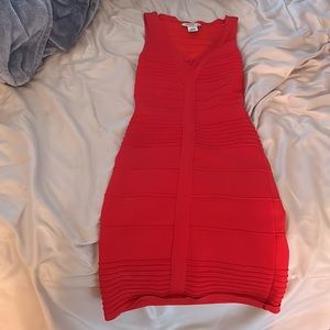 red tight dress with cutout in the back